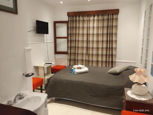 Postel nebo postele na pokoji v ubytování BED AND BREAKFAST- Alto La Viña- SUITE