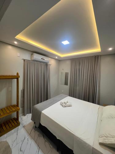 Ένα ή περισσότερα κρεβάτια σε δωμάτιο στο Apartamento Brisa Icaraizinho Villa brisa Icaraizinho