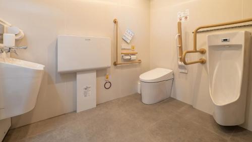 Vannituba majutusasutuses Toyoko Inn Tokorozawa-eki Nishi-guchi