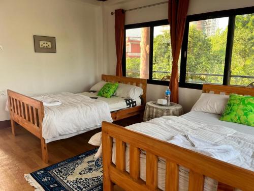 Postel nebo postele na pokoji v ubytování Nest- 5BR Mountain Villa Bandipur