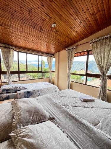 Ένα ή περισσότερα κρεβάτια σε δωμάτιο στο Hotel Casa Grande