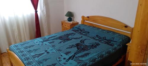 Ένα ή περισσότερα κρεβάτια σε δωμάτιο στο Duplex Mar del tuyu 2