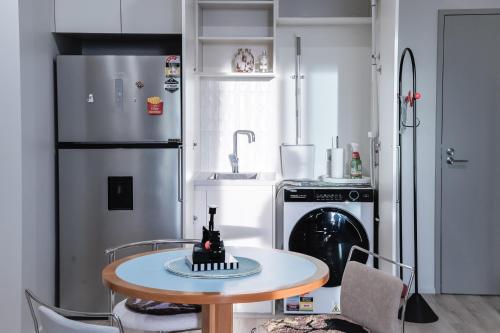 Kuchyň nebo kuchyňský kout v ubytování The Solace - Urban Retreat in Adelaide CBD