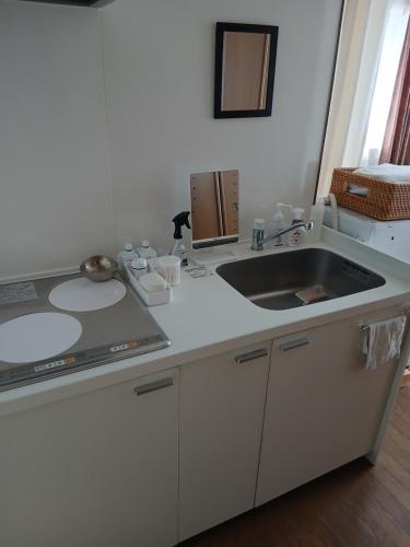 Η κουζίνα ή μικρή κουζίνα στο れのん