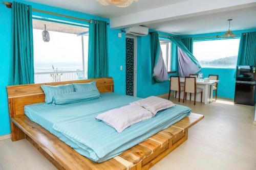 Postel nebo postele na pokoji v ubytování Irini Homestay & Hotel Mui Ne