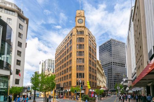 a tall building with a clock tower on top of it at Quest Wellington in Wellington
