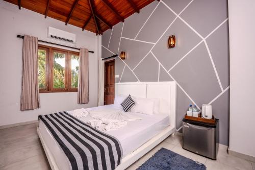 Postel nebo postele na pokoji v ubytování Villa Red Lobster