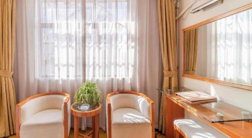 Χώρος καθιστικού στο Lijiang Waika Hotel