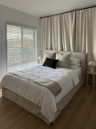 Llit o llits en una habitació de Hillview Studio One