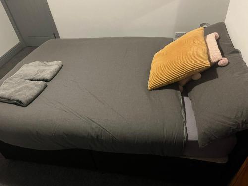 Ένα ή περισσότερα κρεβάτια σε δωμάτιο στο Shelton Guest House