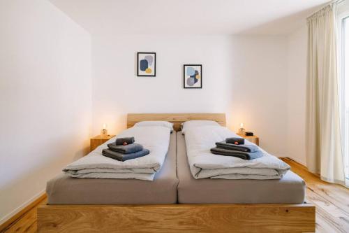 Ένα ή περισσότερα κρεβάτια σε δωμάτιο στο Jungfrau Lake Apartment