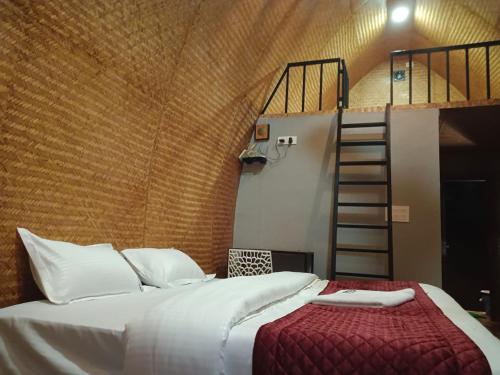 Postel nebo postele na pokoji v ubytování Bhramaram resort