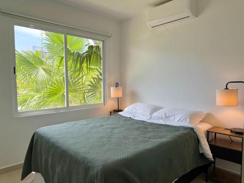 Giường trong phòng chung tại Bonito Depa Cerca de la Playa