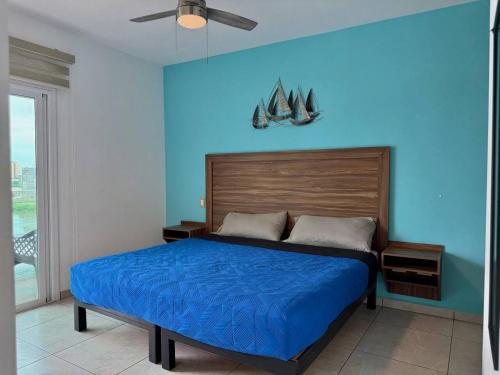 Postel nebo postele na pokoji v ubytování Depa en la Marina Mazatlan Familiar Cerca de la Playa