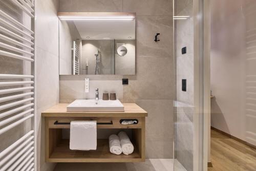 Koupelna v ubytování Hotel Schmuckhof