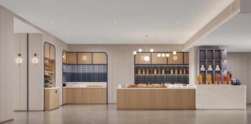 een grote kamer met aasteryasteryasteryasteryasteryasteryasteryasteryasteryasteryasteryasteryasteryasteryasteryasteryasteryastery bij Holiday Inn Express Shenzhen Sports Center by IHG in Shenzhen