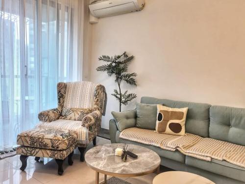 Posezení v ubytování R&F Princess Cove 3BR Boutique JB Central CIQ