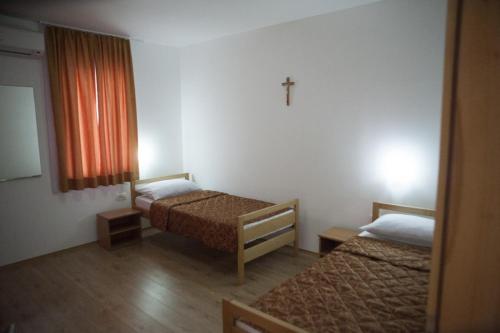 Postel nebo postele na pokoji v ubytování Pansion Magnolia