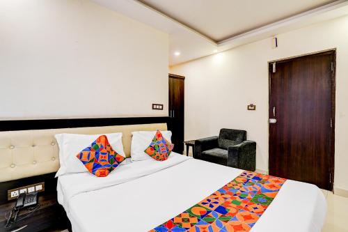 Ένα ή περισσότερα κρεβάτια σε δωμάτιο στο Via Royal Regalia Inn