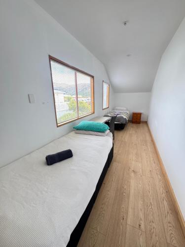 Postel nebo postele na pokoji v ubytování Qt inntouch