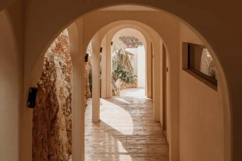 a hallway with an archway in a building at Dali Heartland Castle VILLA Cliffside Sea View Estate in Dali