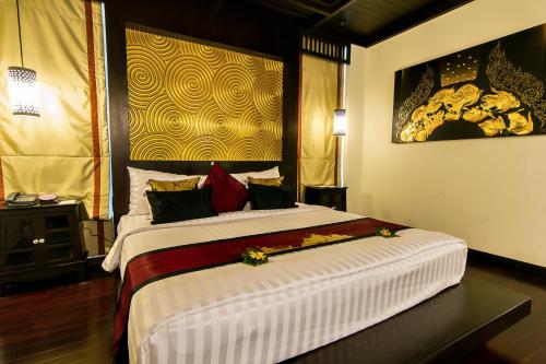 Postel nebo postele na pokoji v ubytování The Elements Krabi Resort - SHA Plus