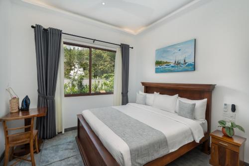 Postel nebo postele na pokoji v ubytování 701 Mawella Villa