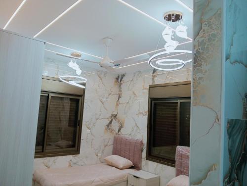 Ένα μπάνιο στο جرادات للشقق المفروشه