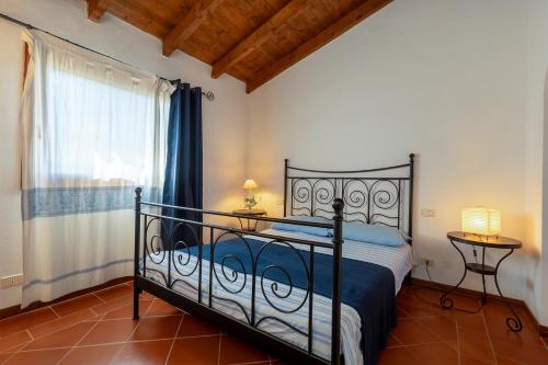 Postel nebo postele na pokoji v ubytování Villa Rosa Con Piscina Privata