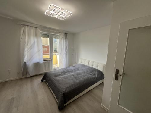 Postel nebo postele na pokoji v ubytování Etw-Sarstedt