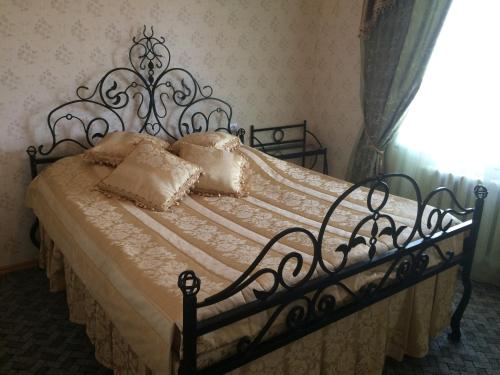 מיטה או מיטות בחדר ב-Health Resort Arzni 1