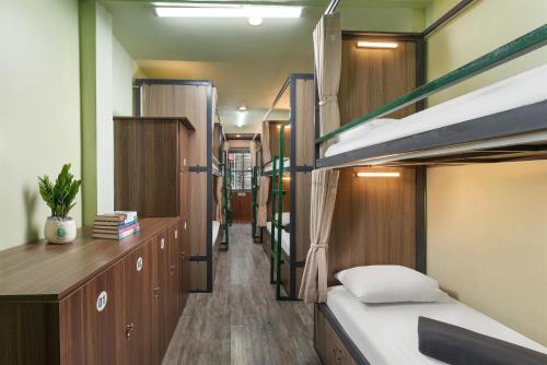 Postel nebo postele na pokoji v ubytování Hanoi EcoStay 2 hostel