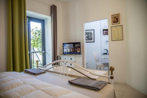 Ένα ή περισσότερα κρεβάτια σε δωμάτιο στο Apartment Victory - San Martino Buon Albergo Verona