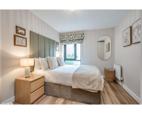 Ένα ή περισσότερα κρεβάτια σε δωμάτιο στο Central Belfast Apartments: Citygate