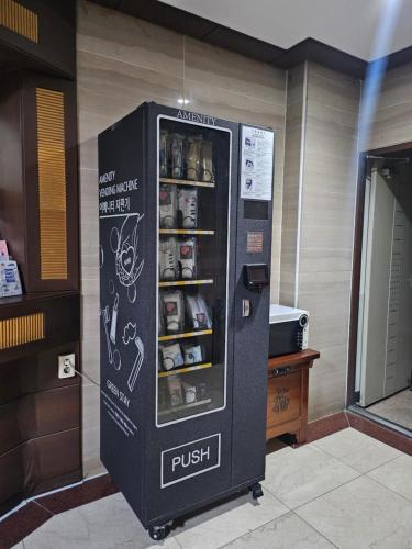 a drink dispensing machine in a building at Washington Motel in Gangneung