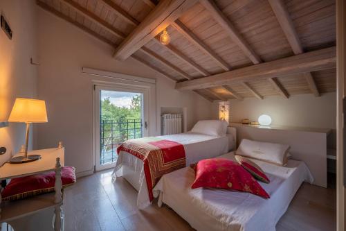 Ένα ή περισσότερα κρεβάτια σε δωμάτιο στο VILLA SPARTA 8&2, Emma Villas