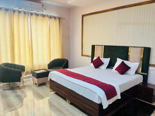 Postel nebo postele na pokoji v ubytování Hotel Agm