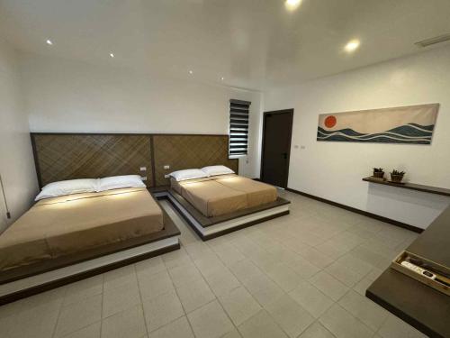 Postel nebo postele na pokoji v ubytování Onda Resort Pacifico