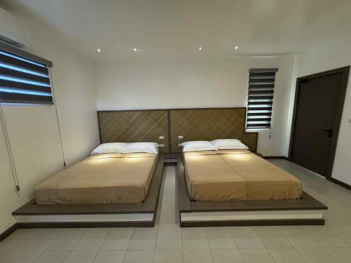 Postel nebo postele na pokoji v ubytování Onda Resort Pacifico