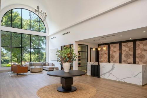 a living room with a table and a couch at Residence Inn Atlanta Buckhead/Lenox Park in Atlanta