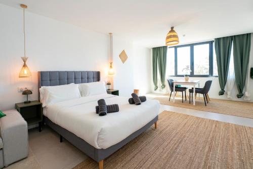 Giường trong phòng chung tại El Mirador Ap