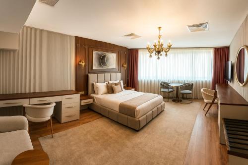 Postel nebo postele na pokoji v ubytování Volonte Hotel & Spa