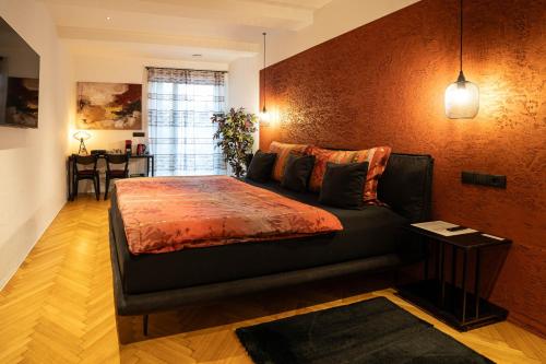 Un pat sau paturi într-o cameră la Laubennest 2