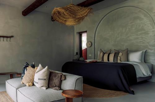 Ένα ή περισσότερα κρεβάτια σε δωμάτιο στο Daily Blossom Stay & More