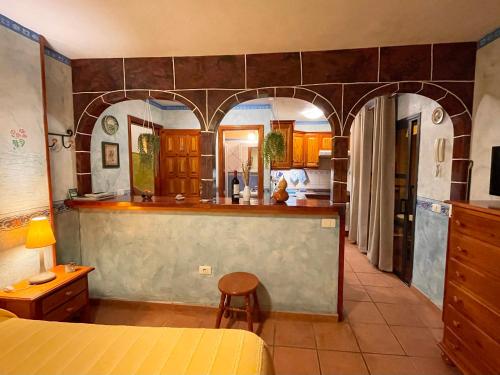 Apartamentos San Jose客房内的一张或多张床位