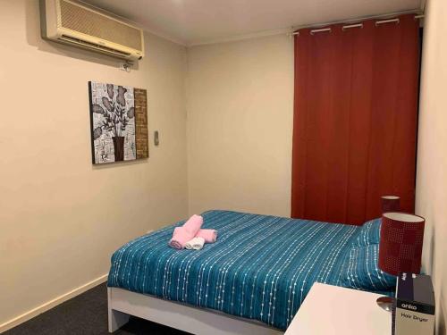 Postel nebo postele na pokoji v ubytování Chadstone Holiday W6 Villa