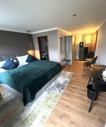 Hotel BALTICpetite tesisinde bir odada yatak veya yataklar