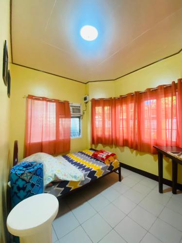 Postel nebo postele na pokoji v ubytování Namasté Olango Guest House