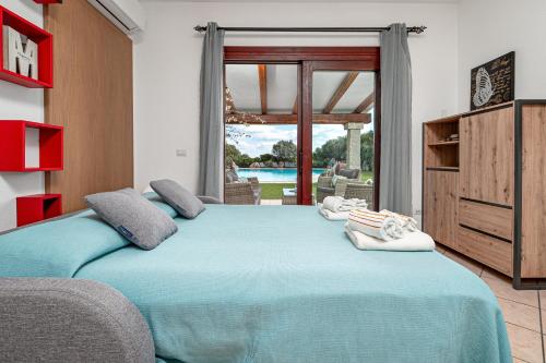 Postel nebo postele na pokoji v ubytování Sarda Bella Private Pool