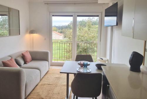 Posezení v ubytování Apartamento Estudio con Wifi, Piscina y Parking